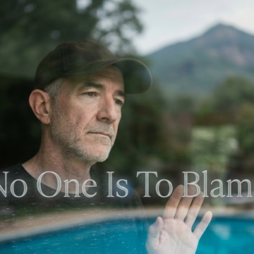 no one is to blame banner